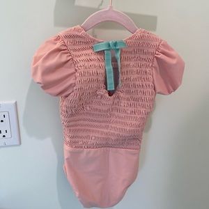 Minnow Swim girls sorbet pink puff sleeve smocked one piece